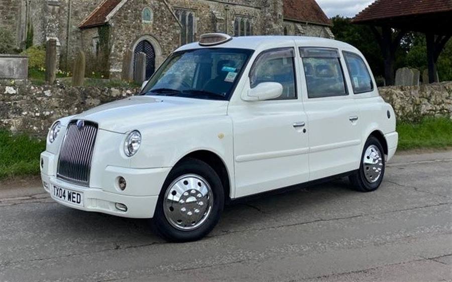 White London Taxi TX4 Elegance Bertie Taxi wedding car in