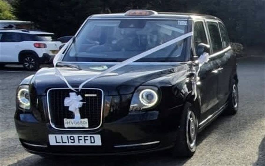 Black Black Cab Hybrid TX LEVC Taxi wedding car in Port Glasgow 11869