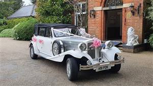 Beauford 4 Door Long Bodied Wedding car. Click for more information.