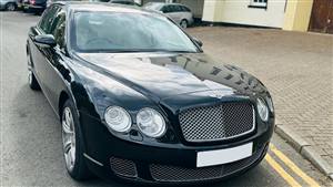 Bentley Flying Spur Wedding car. Click for more information.