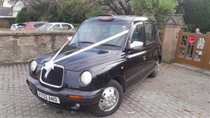 London Taxi TX4 (Belle) Wedding car. Click for more information.